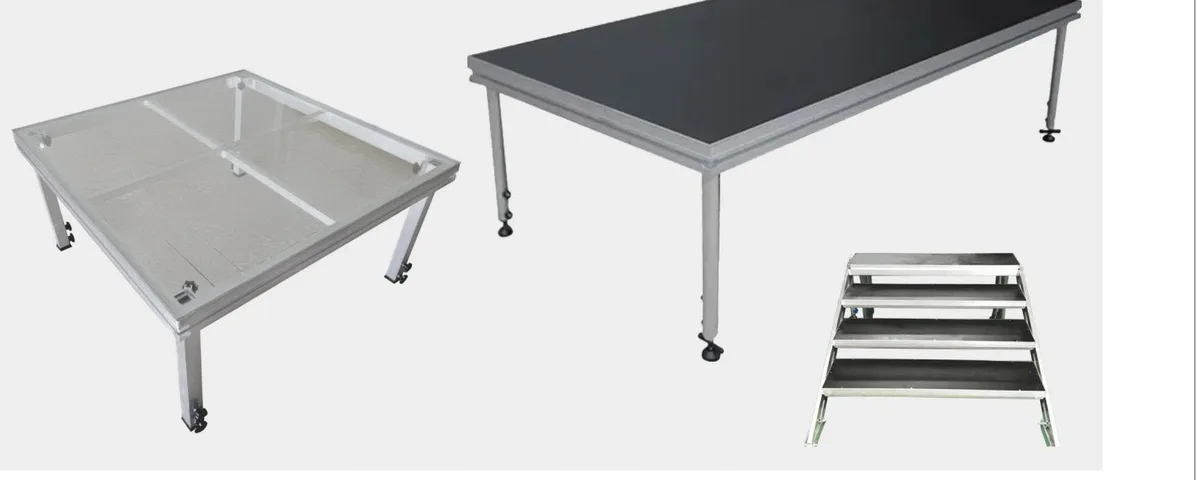 Portable stage platforms with glass top and black skid-proof top on aluminum legs, shown with a step unit