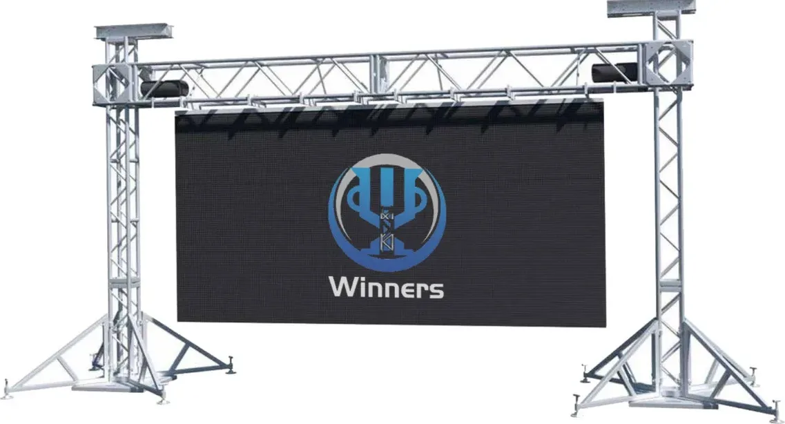 Two galvanized truss towers with a suspension beam supporting a large LED video screen